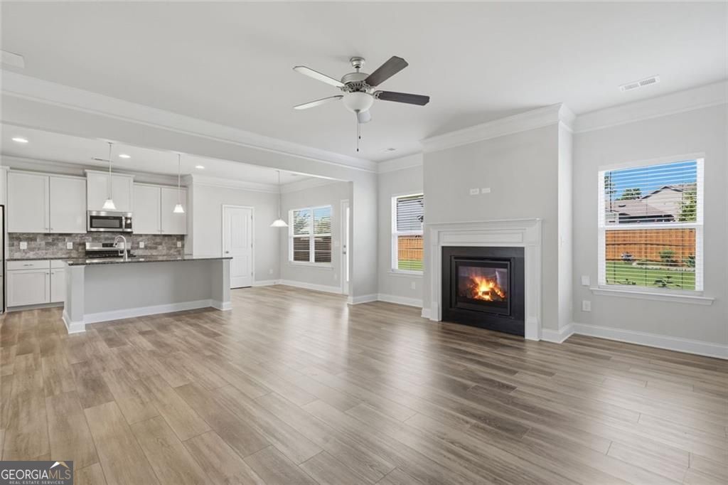 Flawlessly maintained and thoughtfully designed, this home exudes the – image 16