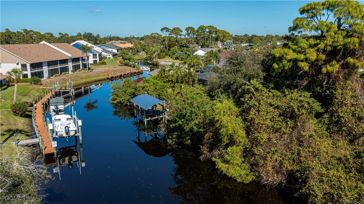 Welcome to your future GULF ACCESS HIDDEN GEM OF A home in the charmin – image 43