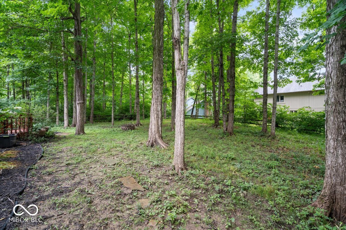 Updates galore in desirable Feather Cove III! Nestled on a half-acre w – image 37