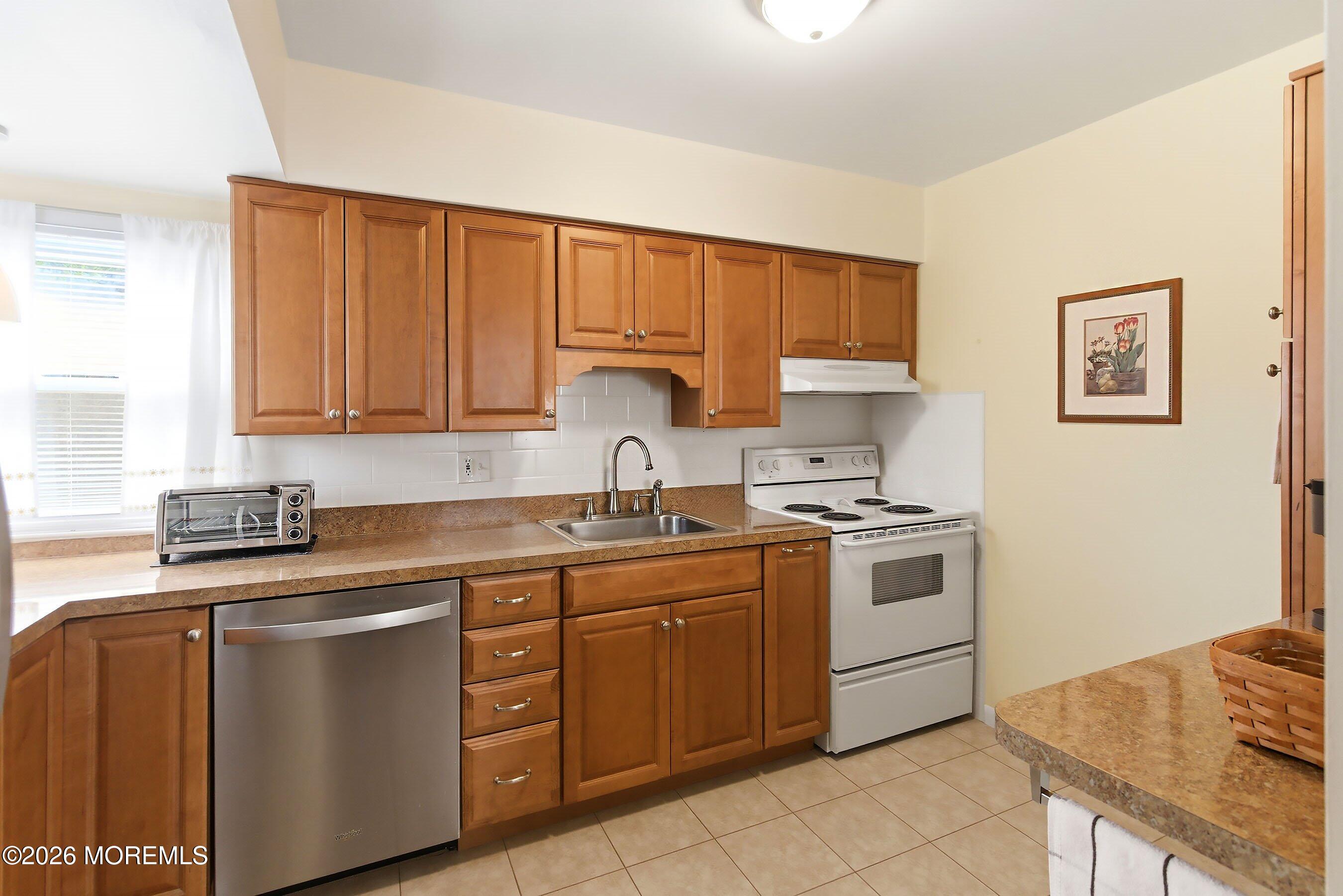Pride of ownership shines throughout this 3-bedroom, 2-bath home, offe – image 6