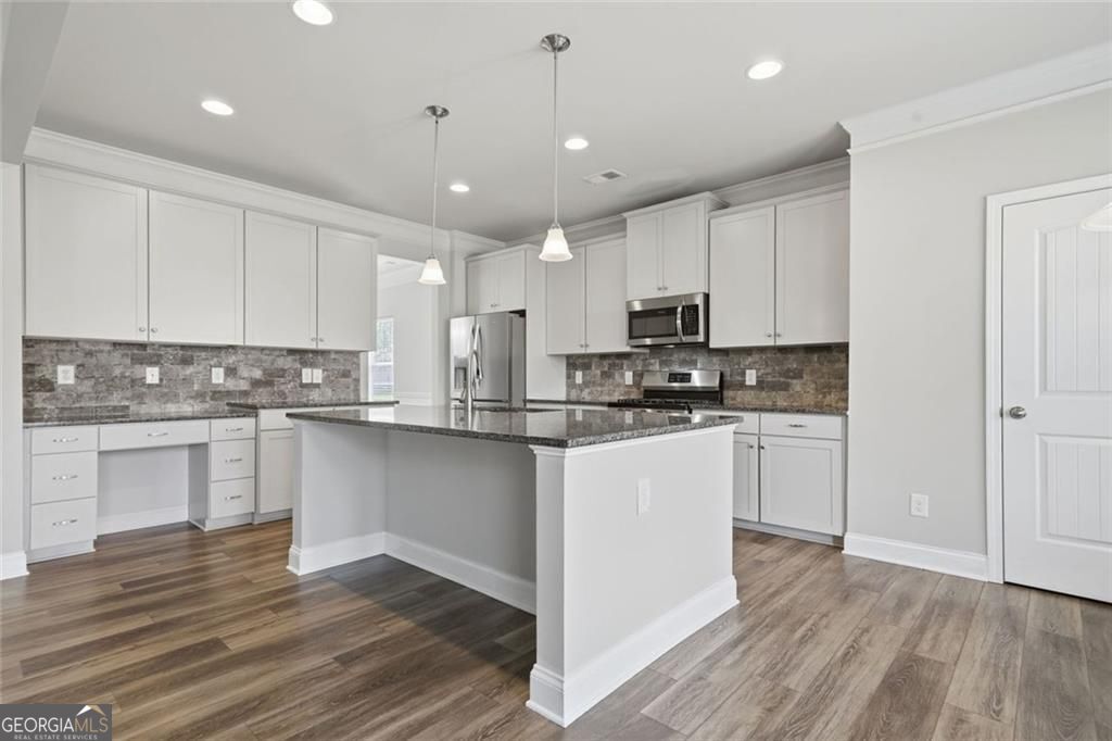 Flawlessly maintained and thoughtfully designed, this home exudes the – image 18