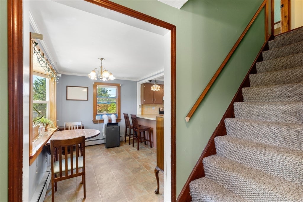 Nestled on over 2 acres, this Classic New England Cape offers the perf – image 24