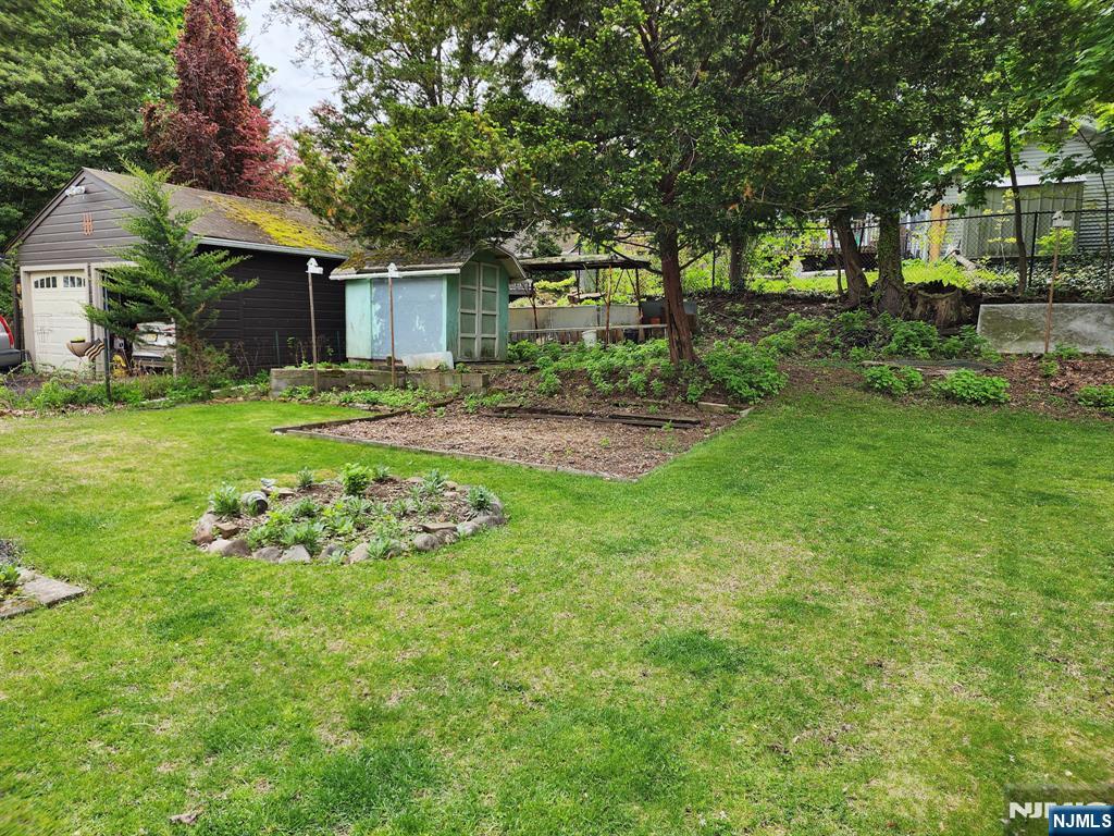 Located in a sought after neighborhood of Harrington Park, this expand – image 15
