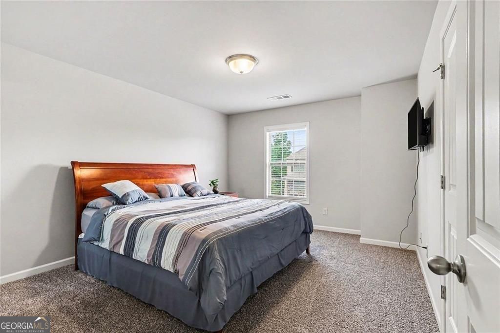 Location, location for this one, so close to the Mall of Georgia with – image 24