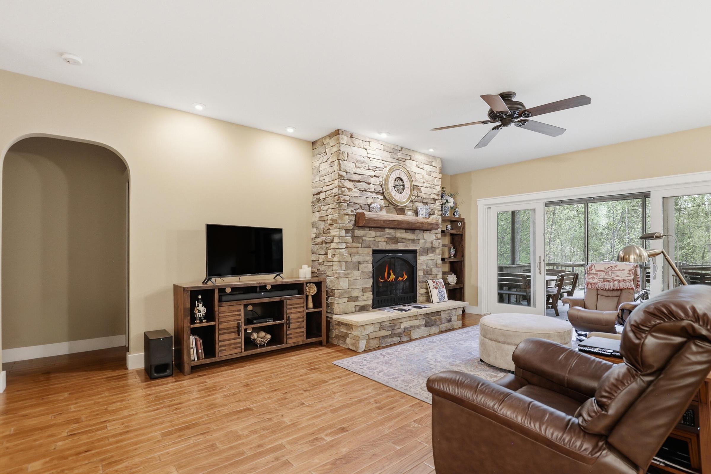 Tucked away on over an acre along the Little Muskegon River in the hea – image 13