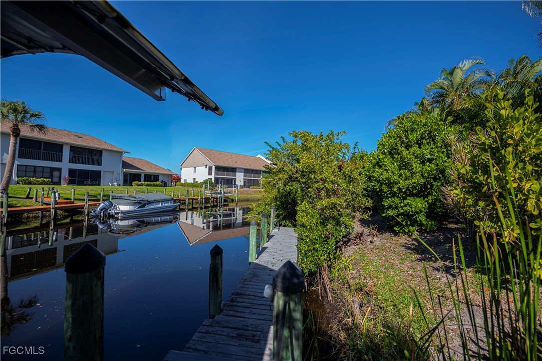 Welcome to your future GULF ACCESS HIDDEN GEM OF A home in the charmin – image 42