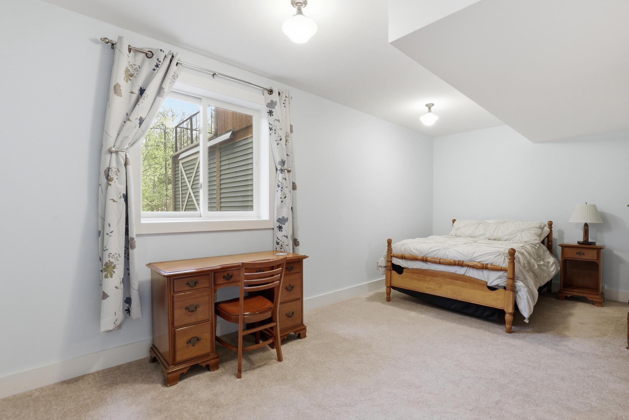 Tucked away on over an acre along the Little Muskegon River in the hea – image 40