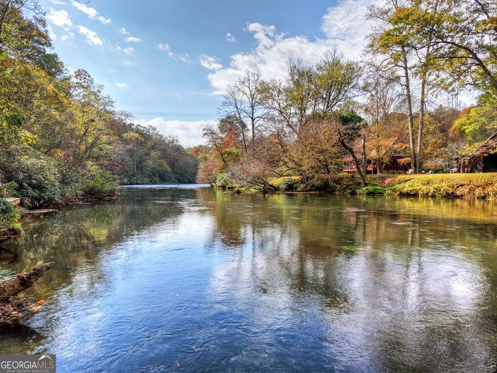 Welcome to your Private RIVERFRONT DREAM HOME on the shimmering shores – image 2