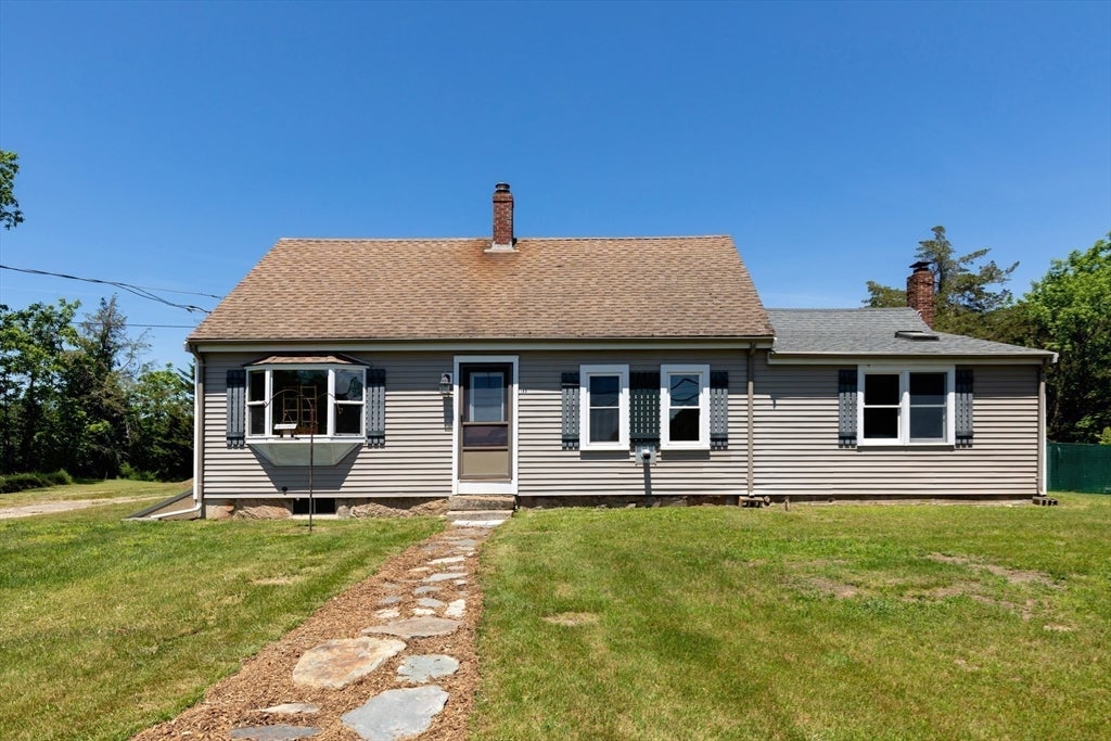 Nestled on over 2 acres, this Classic New England Cape offers the perf – image 28
