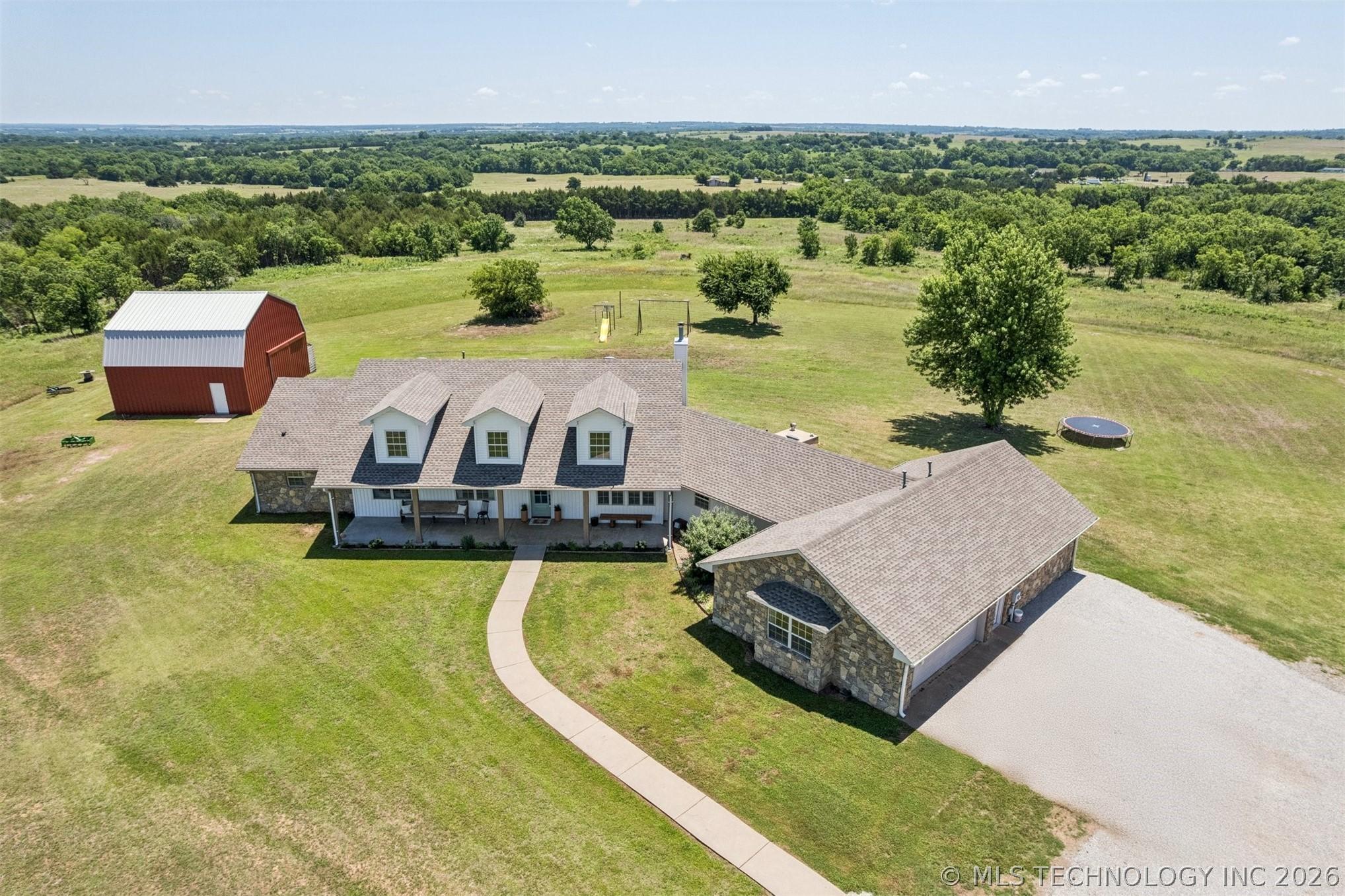 Country Luxury at Its Finest! Nestled on 18 breathtaking acres with pa – image 6