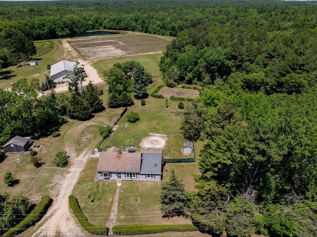 Nestled on over 2 acres, this Classic New England Cape offers the perf – image 38