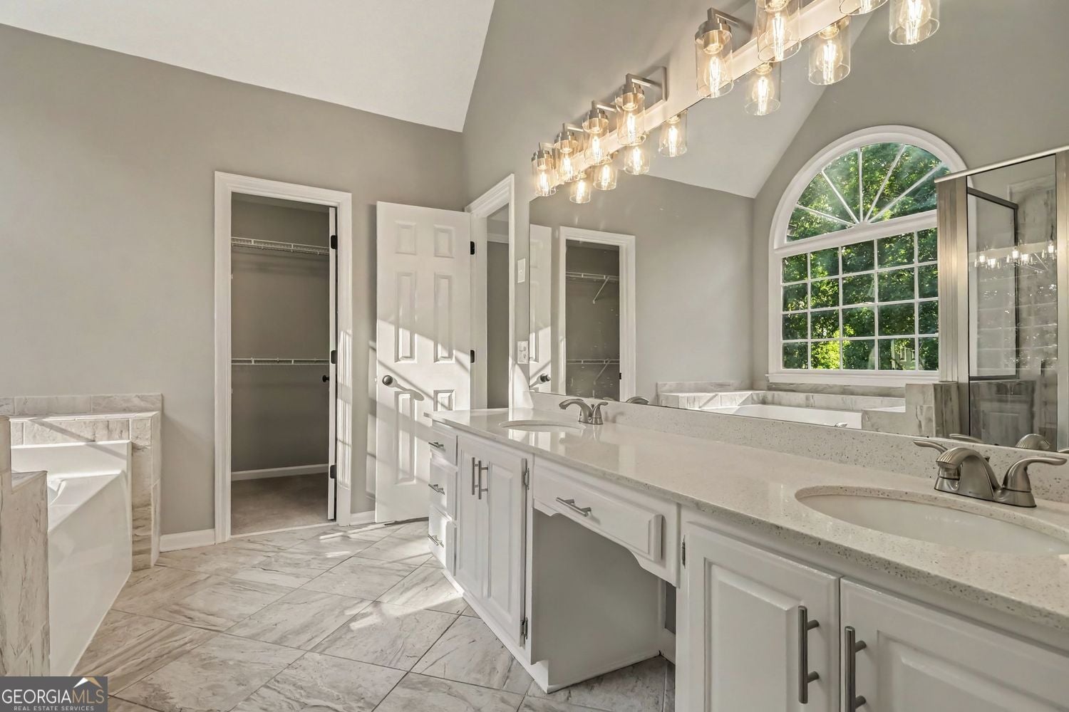 Welcome to a beautifully renovated home featuring a fully finished bas – image 17
