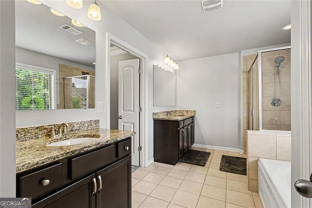 Location, location for this one, so close to the Mall of Georgia with – image 34