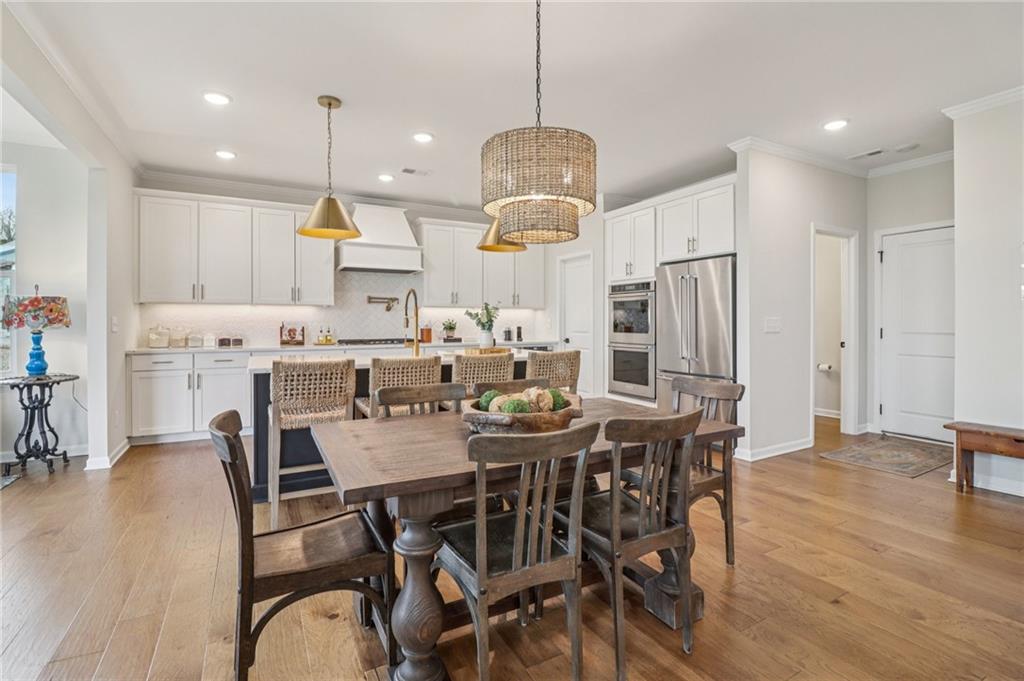 Welcome to luxury living in the heart of West Forsyth, where designer – image 11