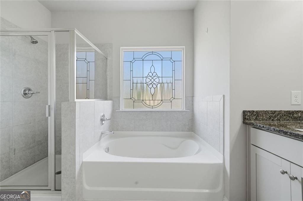 Flawlessly maintained and thoughtfully designed, this home exudes the – image 48
