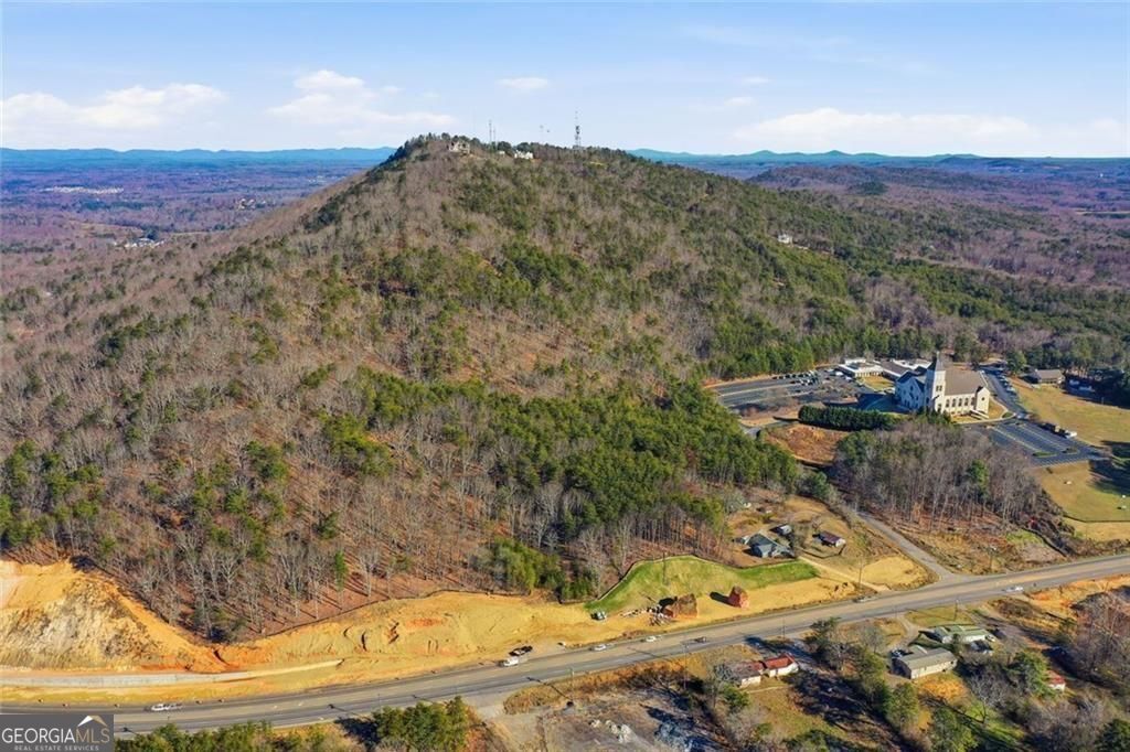 A mountain retreat in the heart of Forsyth. This extraordinary 6+ acre – image 2
