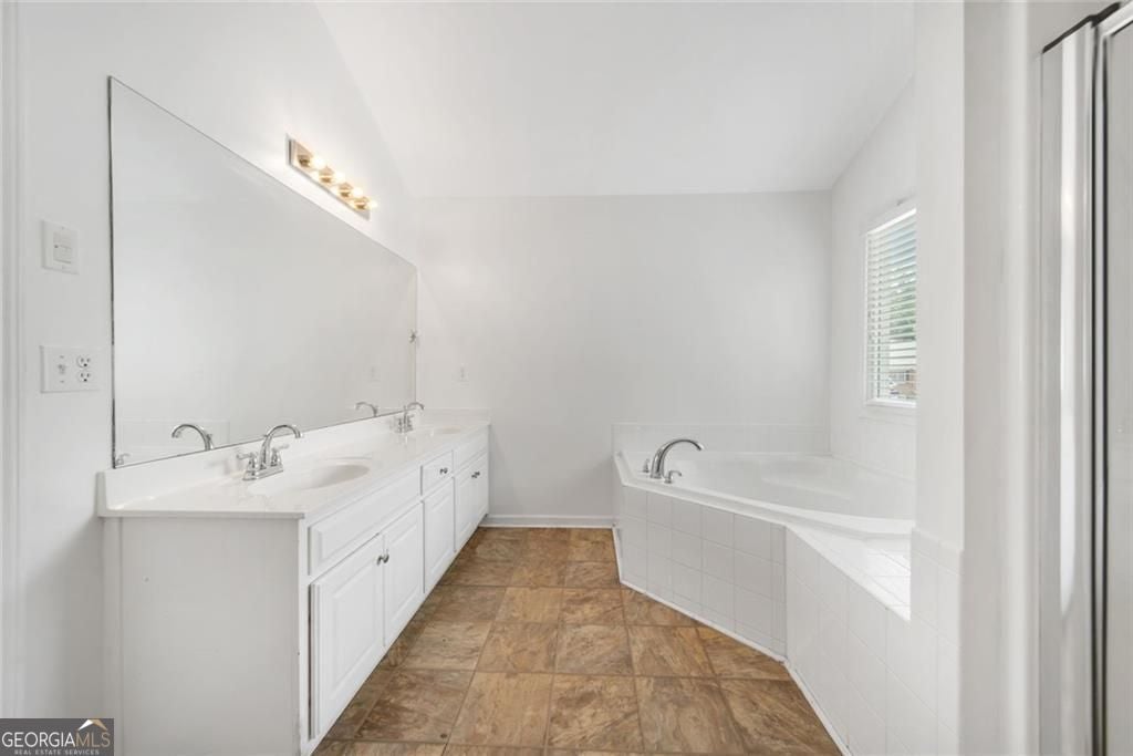 Just listed in the sought-after Arbors at Old Peachtree subdivision! T – image 29