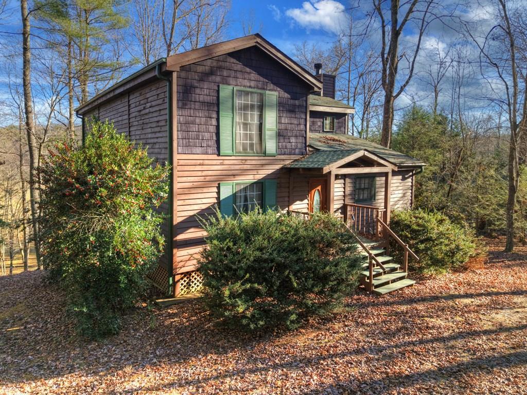 Look “Beyond the Ordinary” at this Distinctive “Furnished” Cabin which – image 4