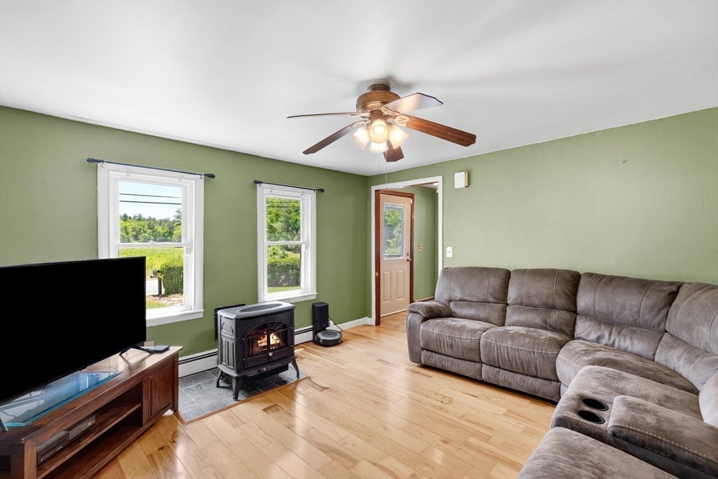 Nestled on over 2 acres, this Classic New England Cape offers the perf – image 16