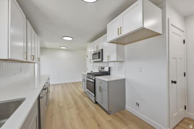 This home is move-in ready! Extra kitchen for extra income. New roof! – image 11