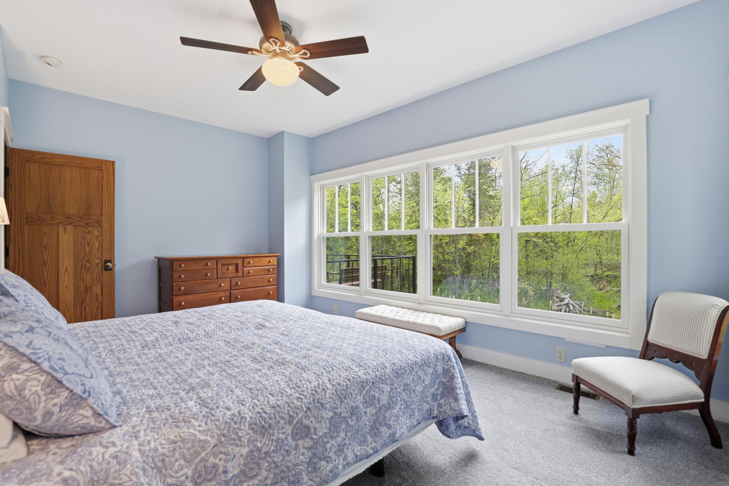 Tucked away on over an acre along the Little Muskegon River in the hea – image 26