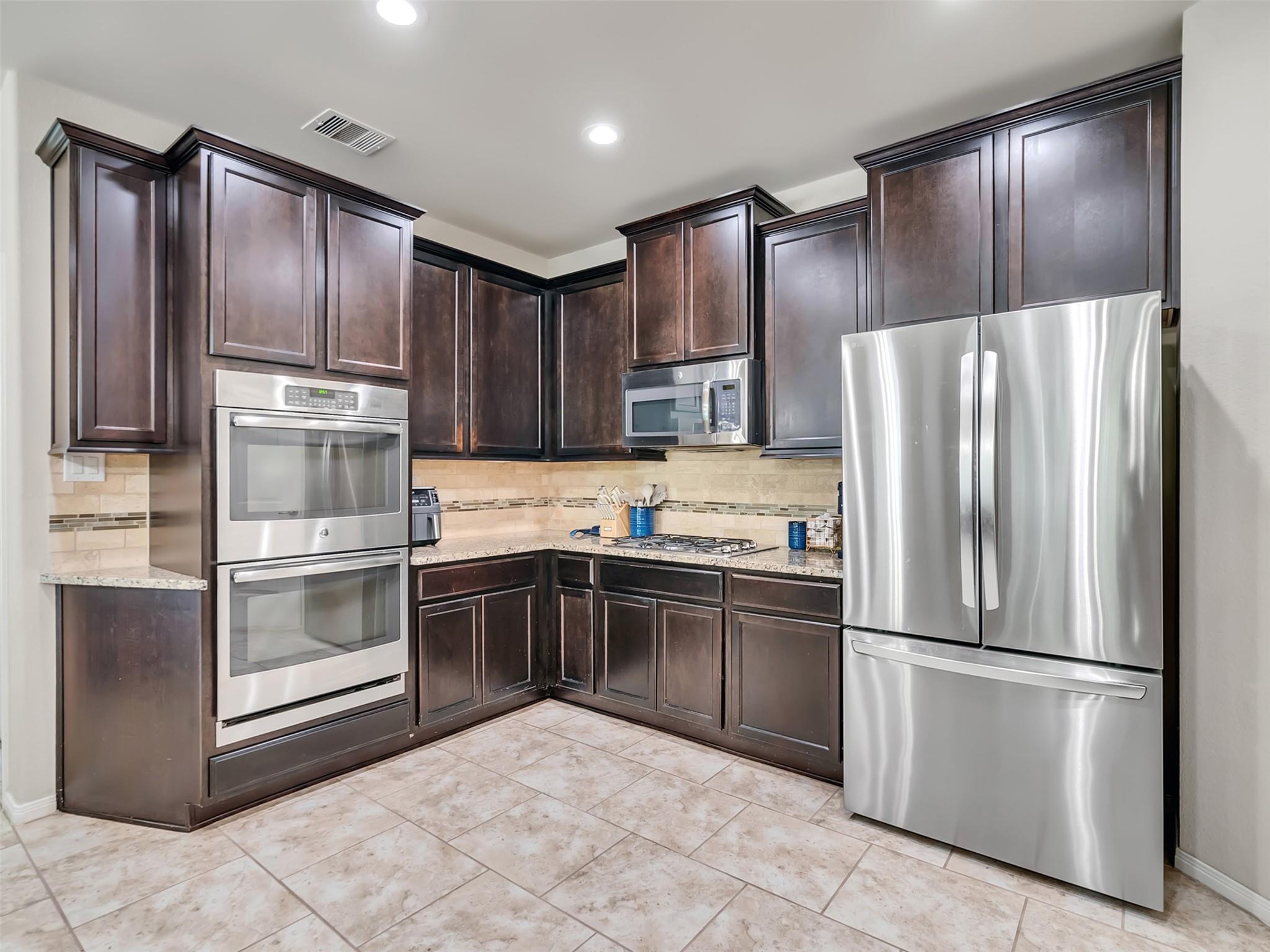 Nestled in a friendly community, this 4-bed, 3.5-bath home offers a pe – image 15