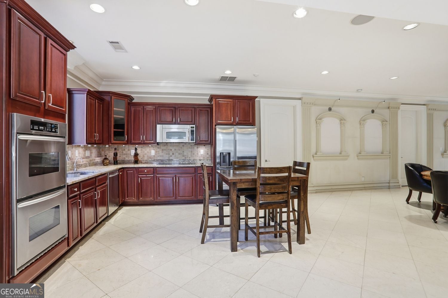 Set on 3.8 beautifully manicured acres, this elegant gated estate offe – image 132