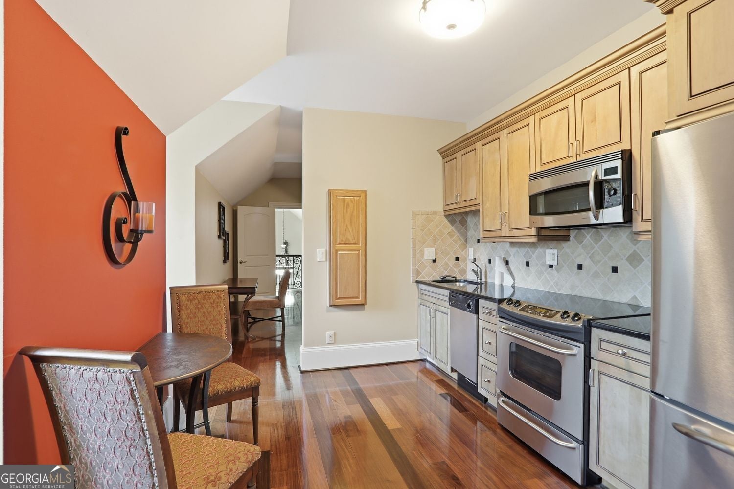 Set on 3.8 beautifully manicured acres, this elegant gated estate offe – image 100