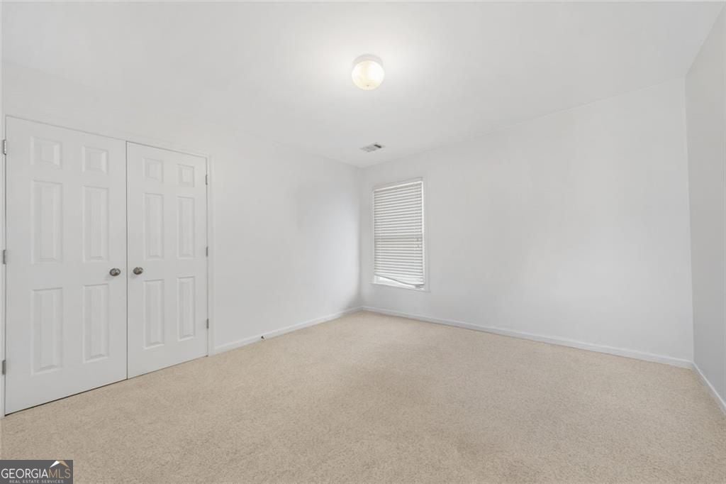 Just listed in the sought-after Arbors at Old Peachtree subdivision! T – image 35