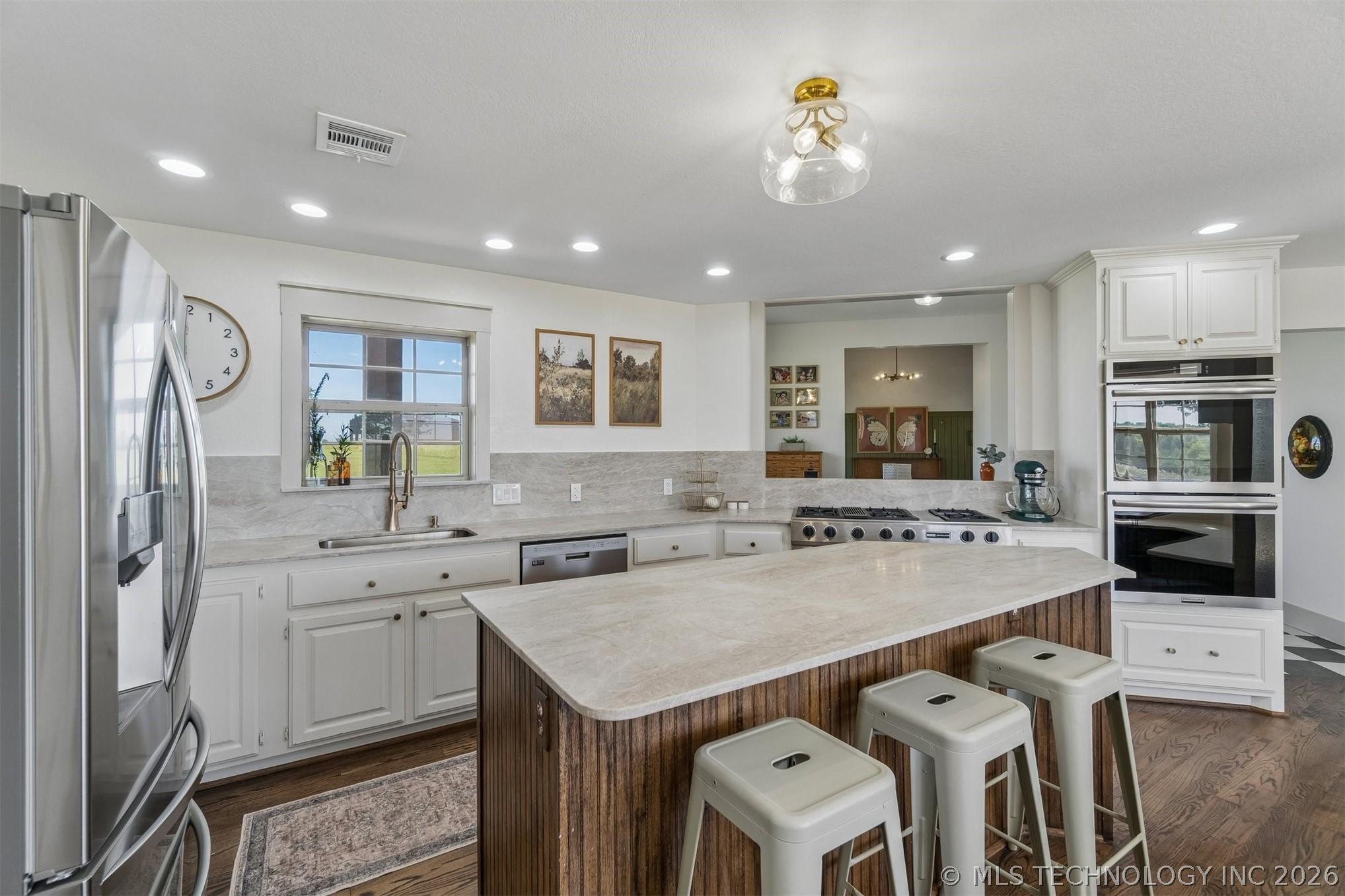 Country Luxury at Its Finest! Nestled on 18 breathtaking acres with pa – image 27