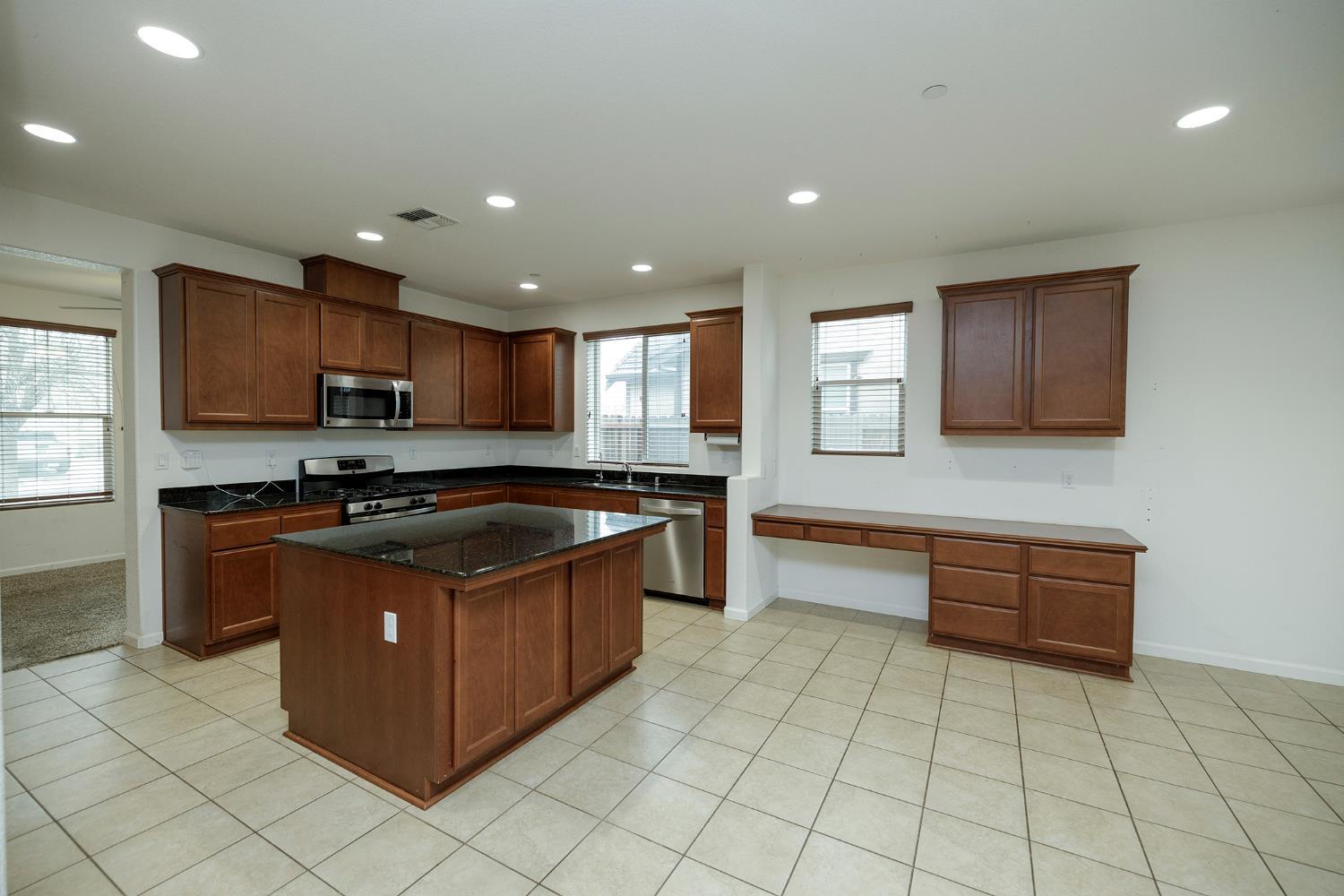 Located in a highly desirable neighborhood, this well-maintained home – image 8
