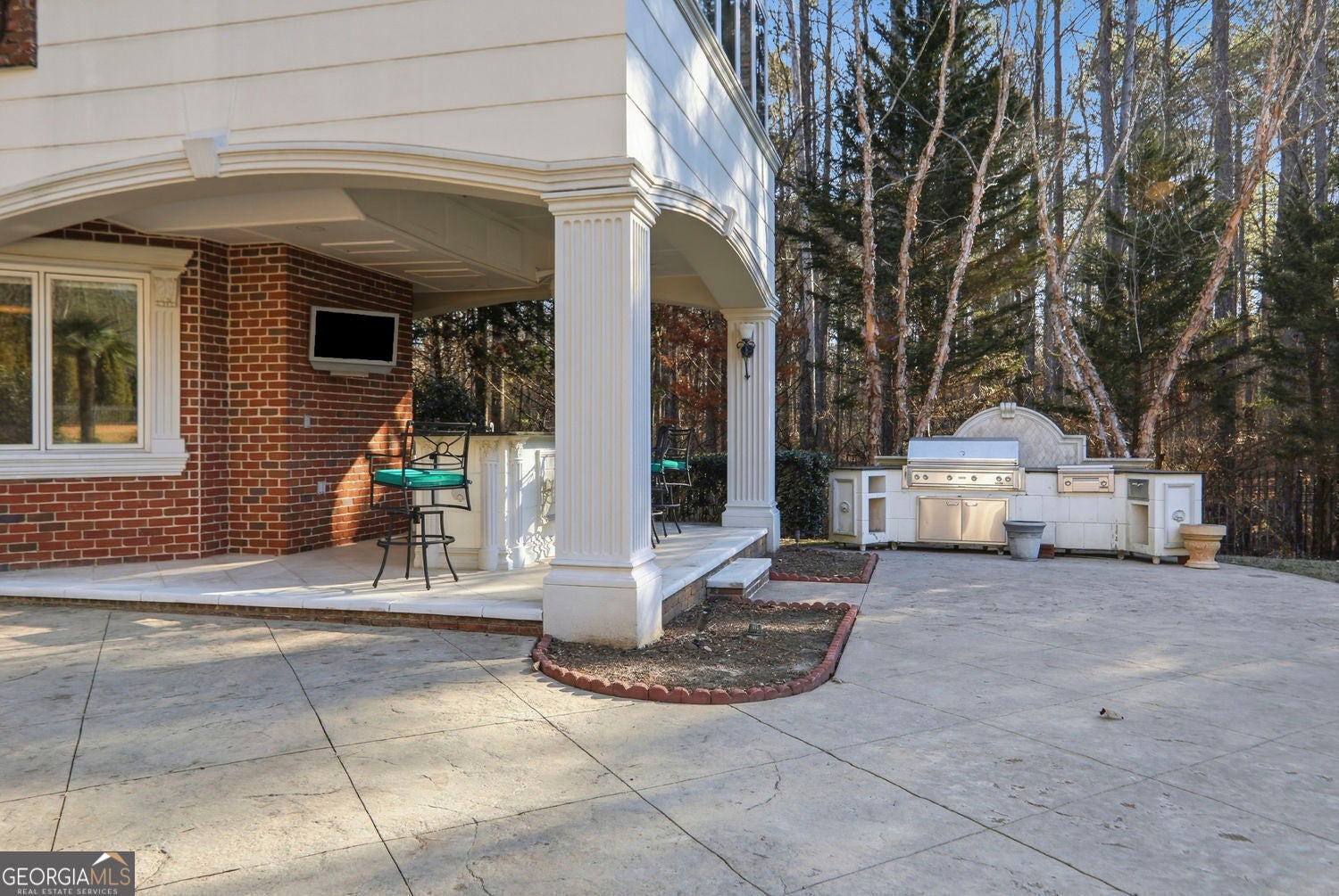 Set on 3.8 beautifully manicured acres, this elegant gated estate offe – image 136