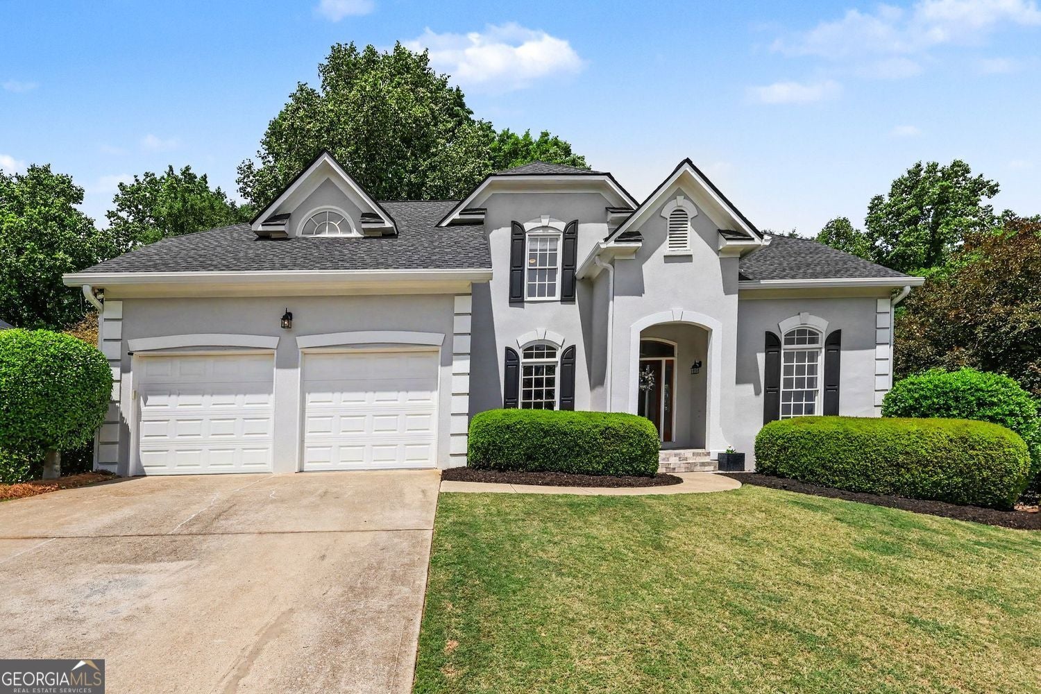 Welcome to 5640 The 12th Fairway, a cul-de-sac home in Olde Atlanta Cl – image 1