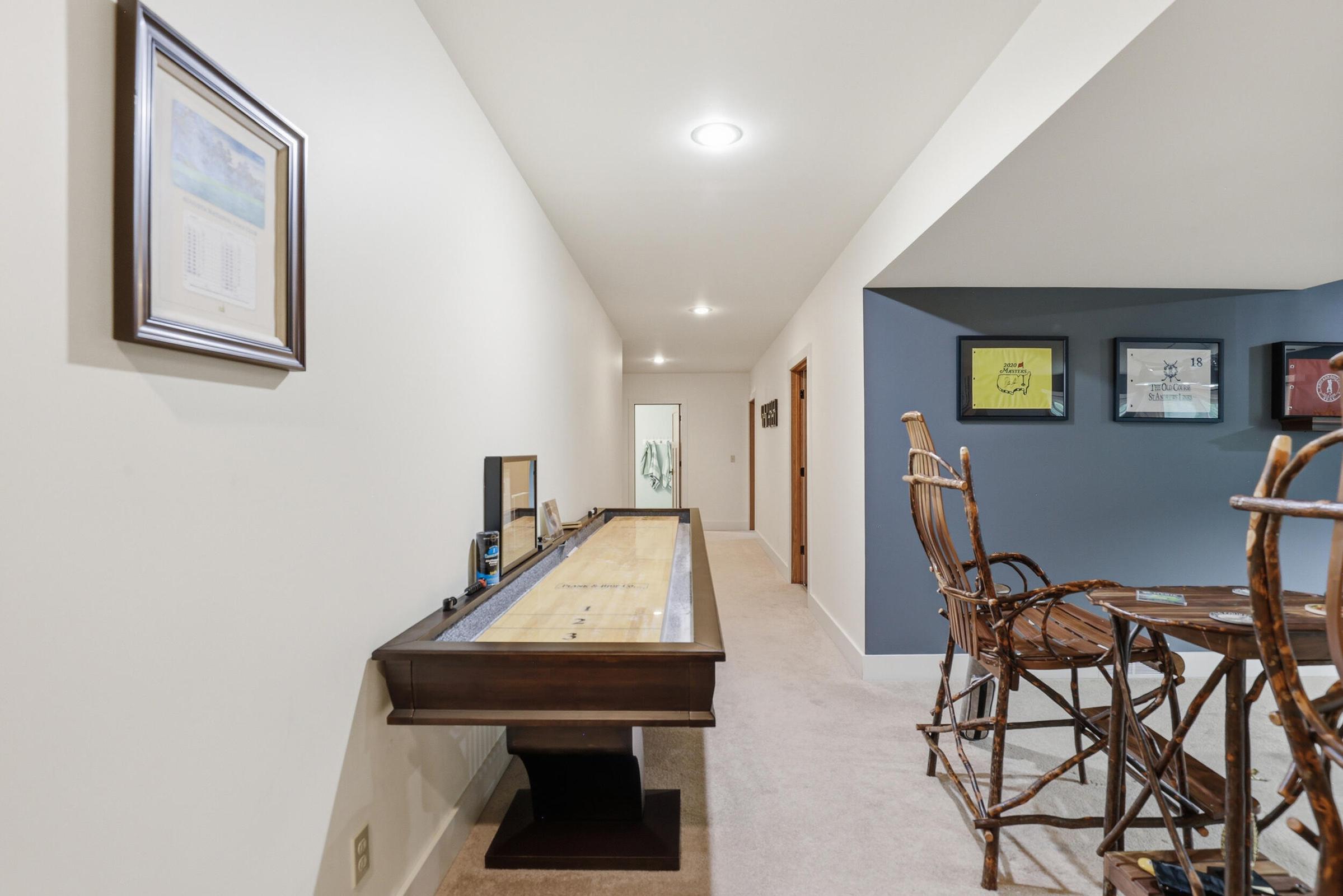 Tucked away on over an acre along the Little Muskegon River in the hea – image 39