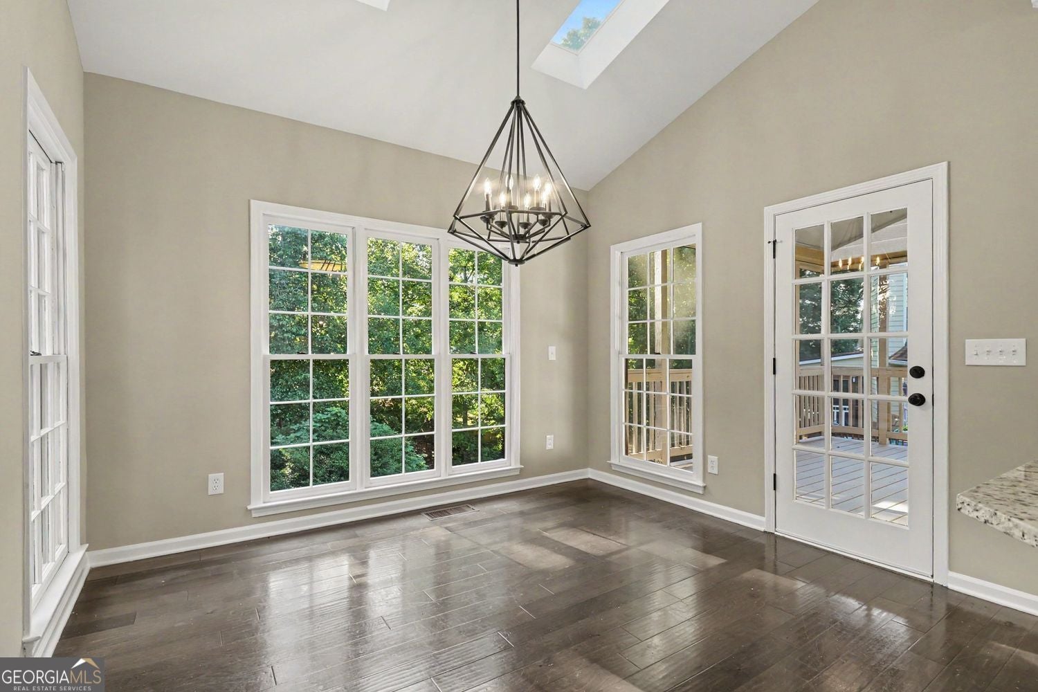 Welcome to a beautifully renovated home featuring a fully finished bas – image 8