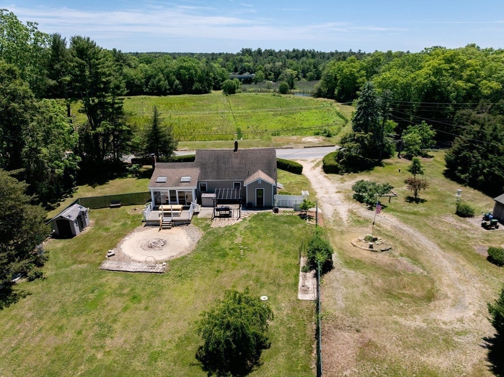 Nestled on over 2 acres, this Classic New England Cape offers the perf – image 39