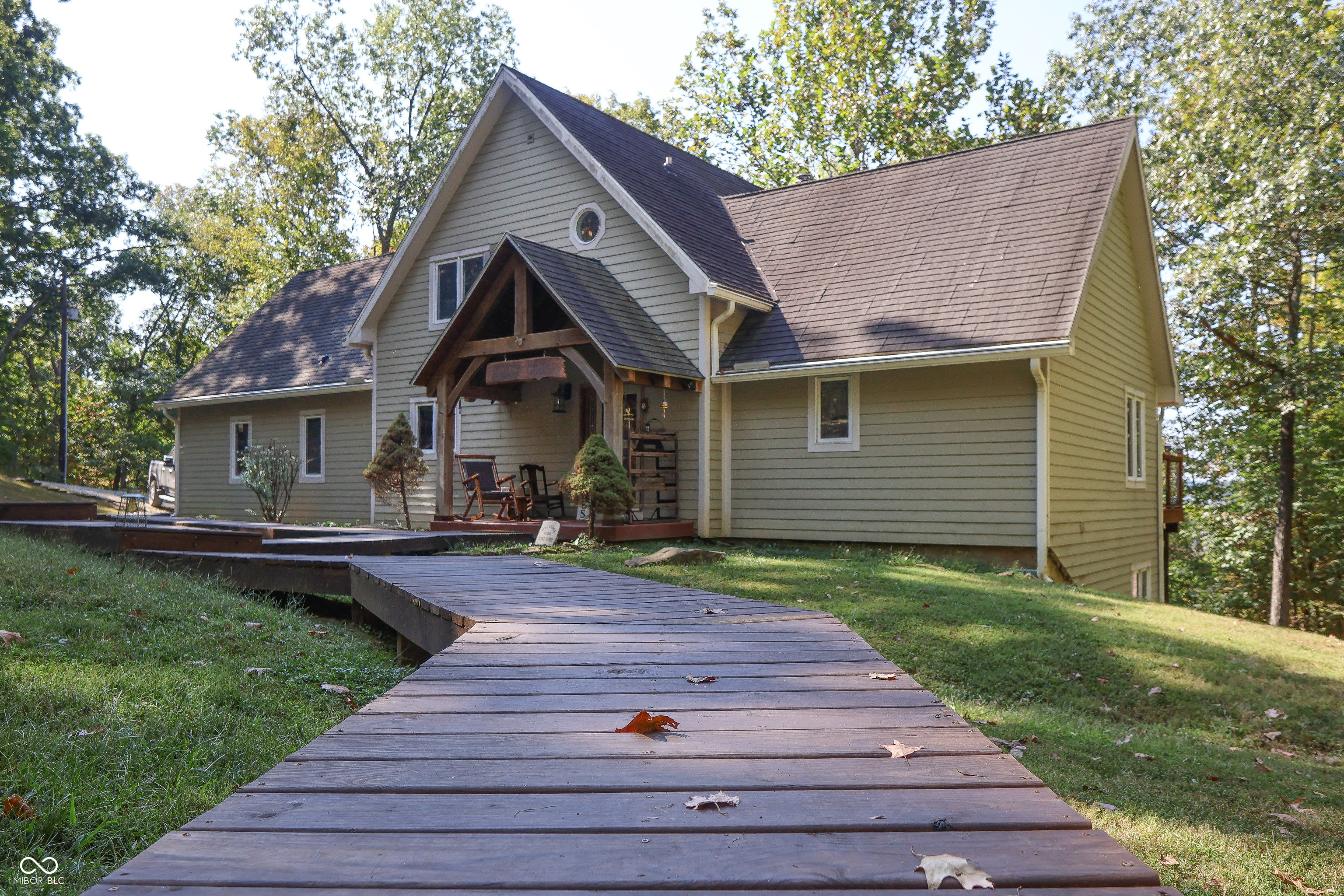 Custom red oak timber-frame home with Lake Monroe views, located in Sa – image 61