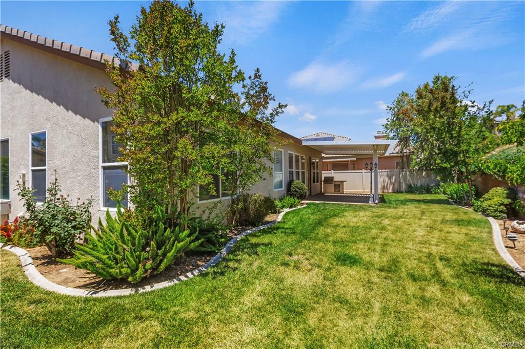 Welcome to this beautifully maintained single-story home located in a – image 30