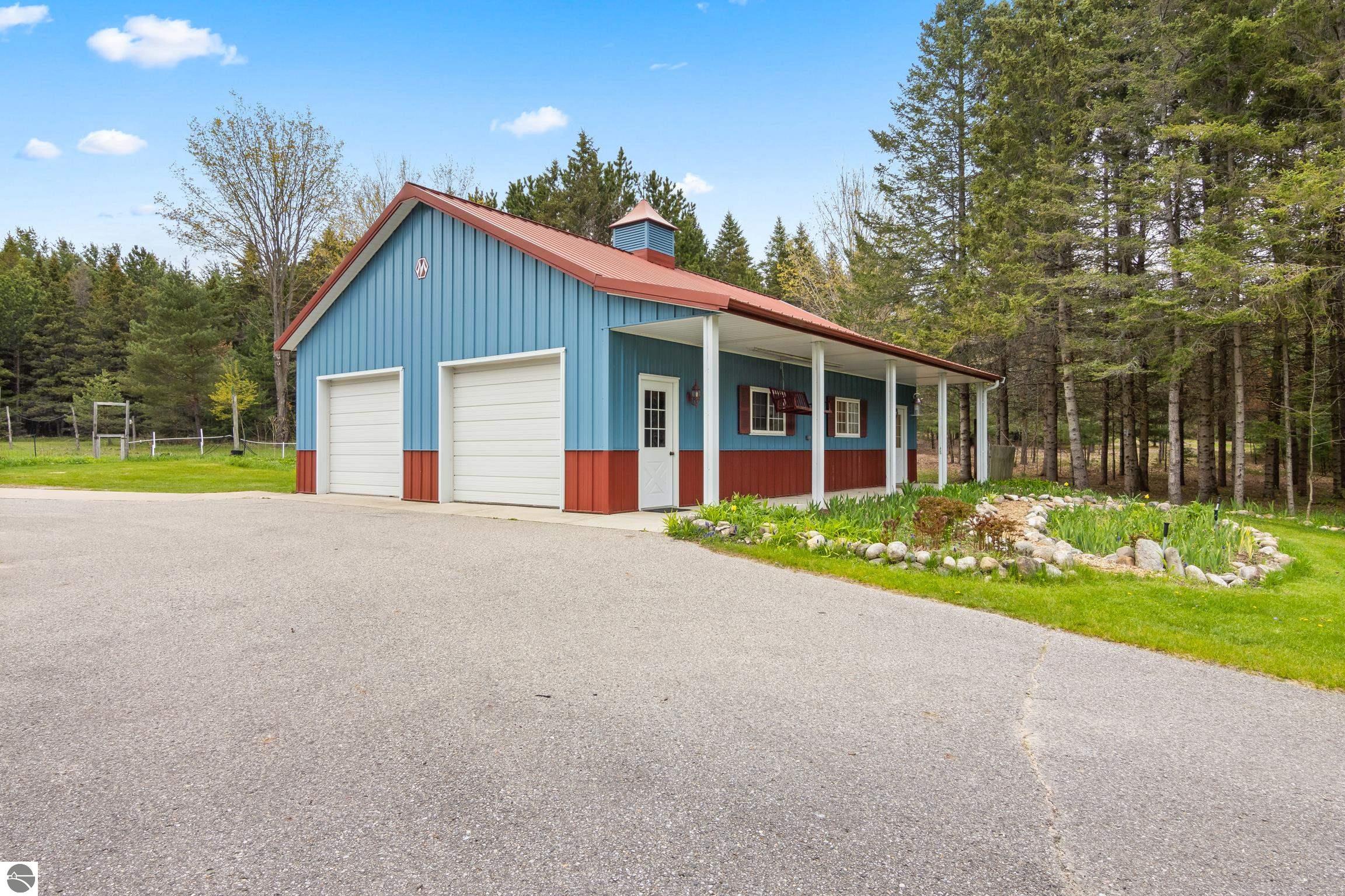 This 3-bedroom, 2.5-bath farmhouse offers a property designed for coun – image 56