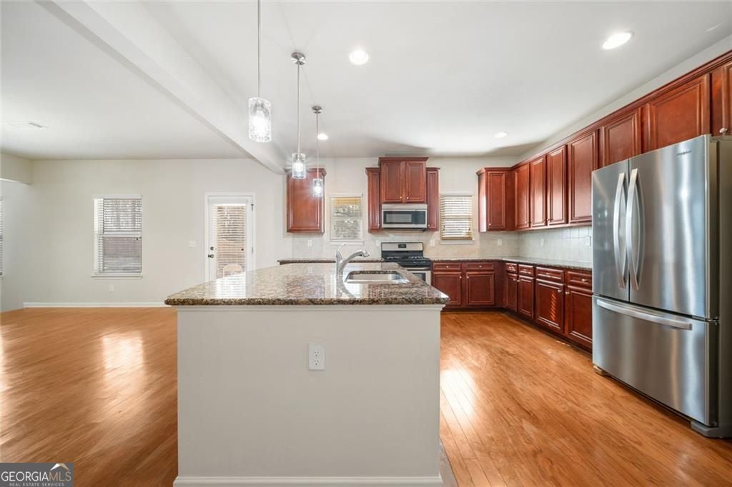 Timeless curb appeal and solid construction define this beautifully ma – image 19