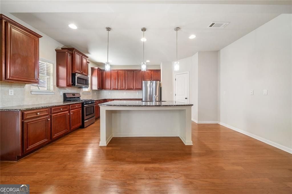 Timeless curb appeal and solid construction define this beautifully ma – image 22