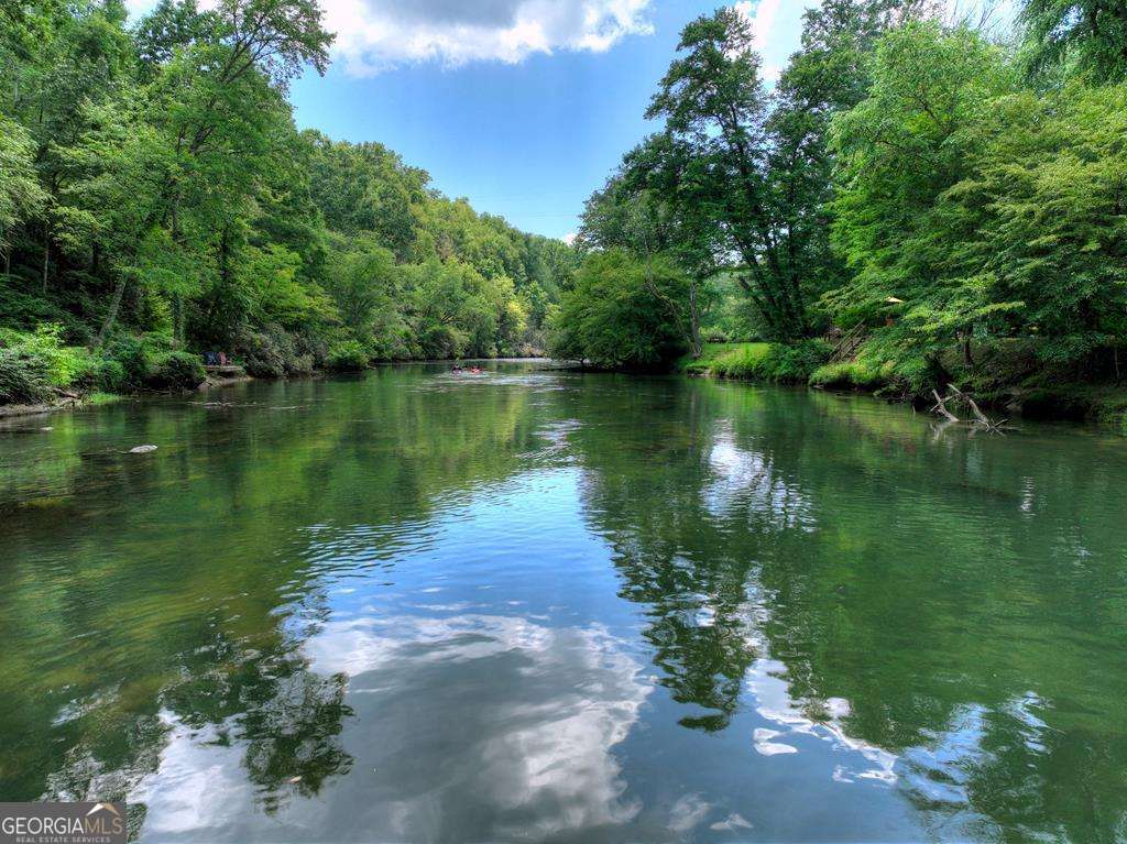 Welcome to your Private RIVERFRONT DREAM HOME on the shimmering shores – image 56