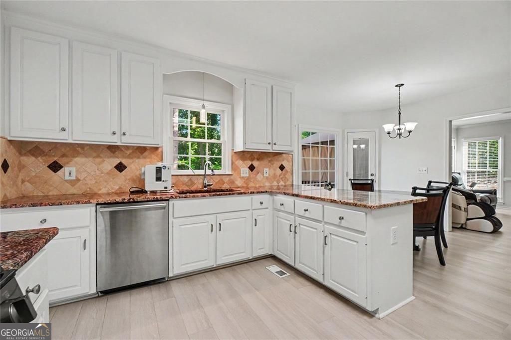 489 Broadstone Way in Brookstone III offers 7 bedrooms and 5 baths, in – image 12