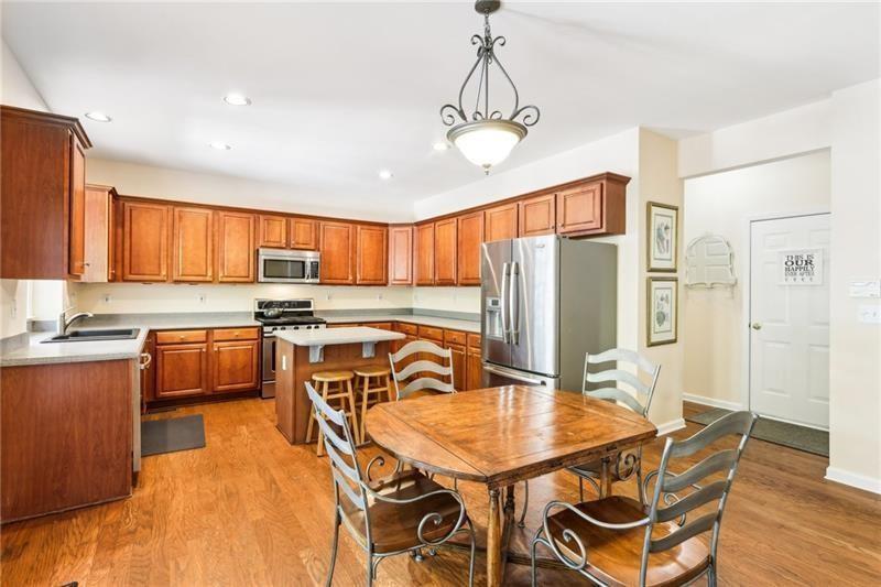 This beautiful home located on a cul-de-sac backs up to a private wood – image 20