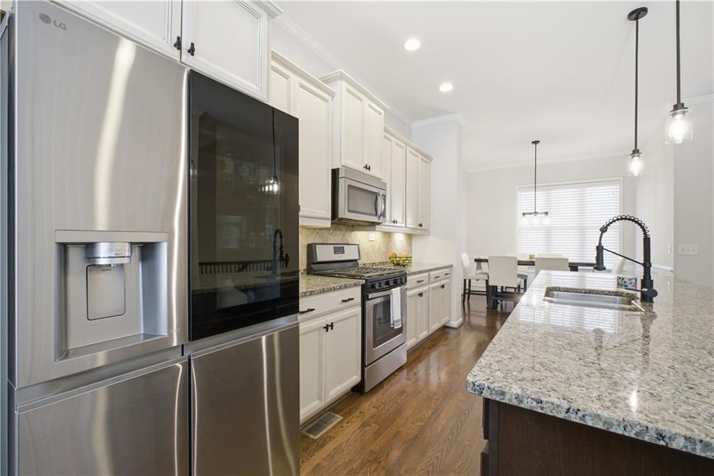 Tucked away in the quiet and welcoming 24-unit community of Brandly Ha – image 3
