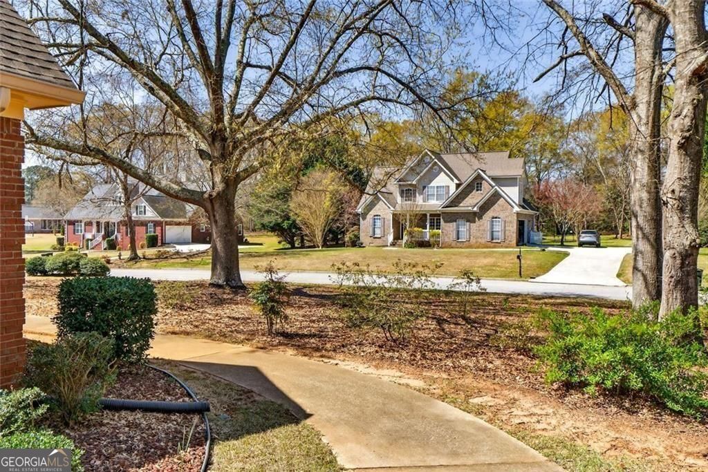WOW - TWO HOMES ON ONE LOT!!! From the moment you arrive, the quality – image 3