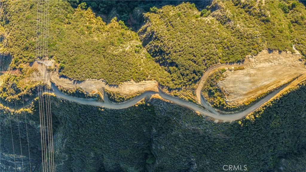 This is a large development project to build out 4 Luxury view homes. – image 11