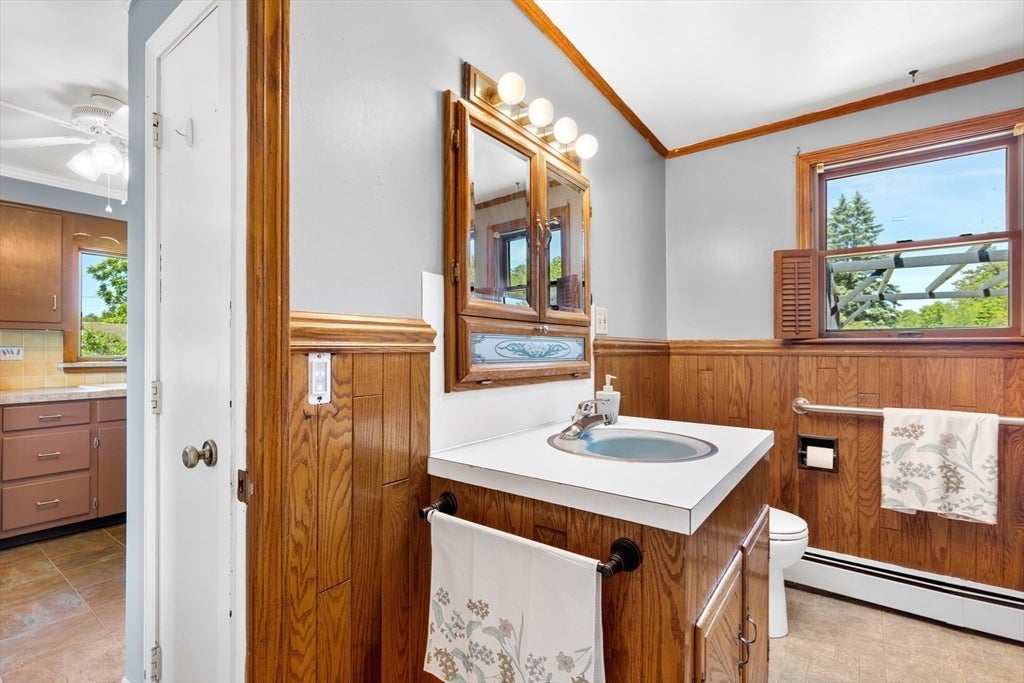 Nestled on over 2 acres, this Classic New England Cape offers the perf – image 11