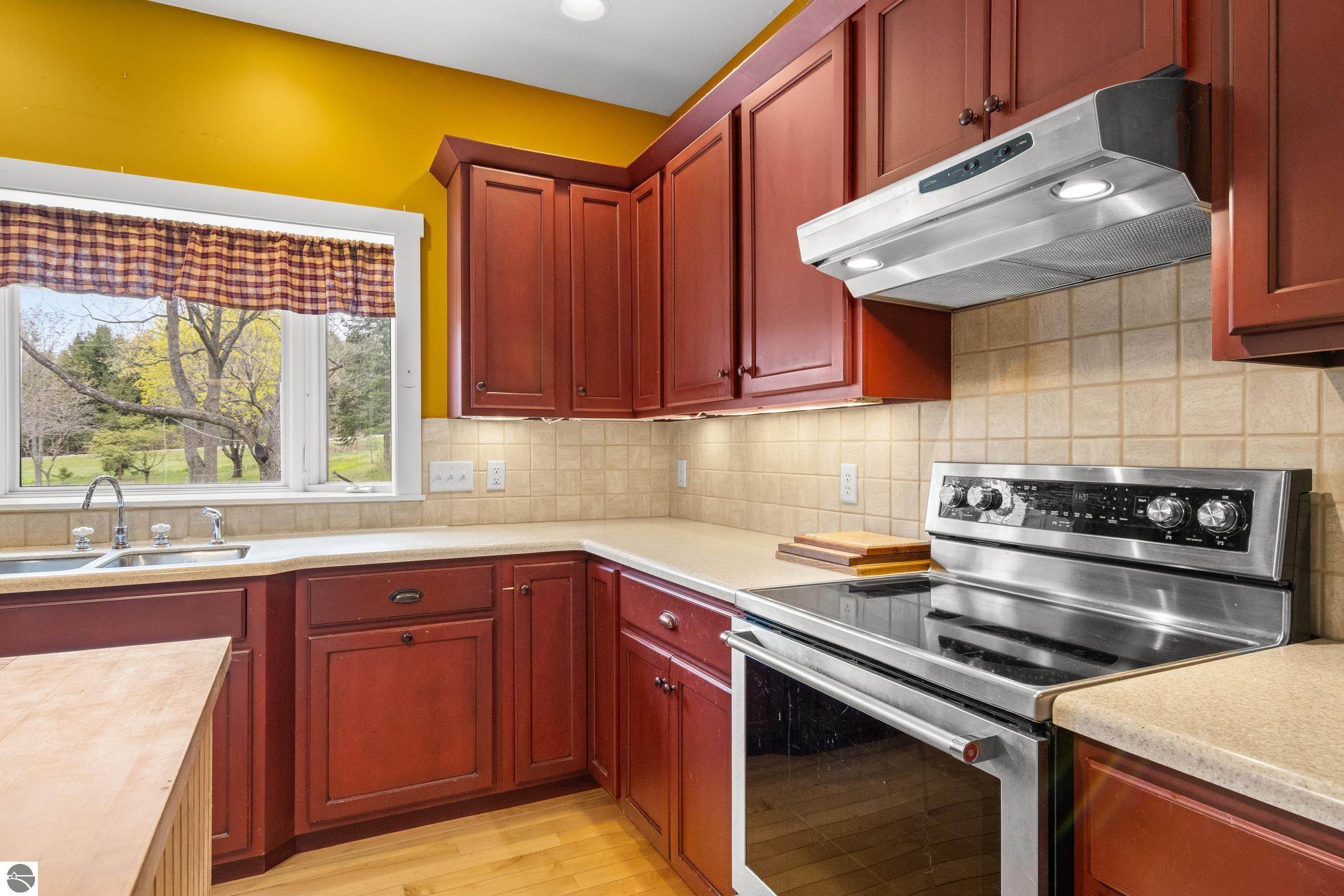 This 3-bedroom, 2.5-bath farmhouse offers a property designed for coun – image 13