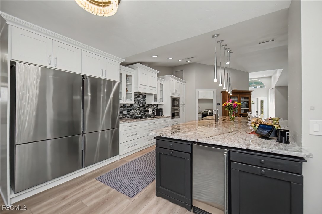 Welcome to your future GULF ACCESS HIDDEN GEM OF A home in the charmin – image 26